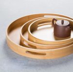 Bamboo Round Serving Tray Set with built-in handles in small, medium, and large sizes